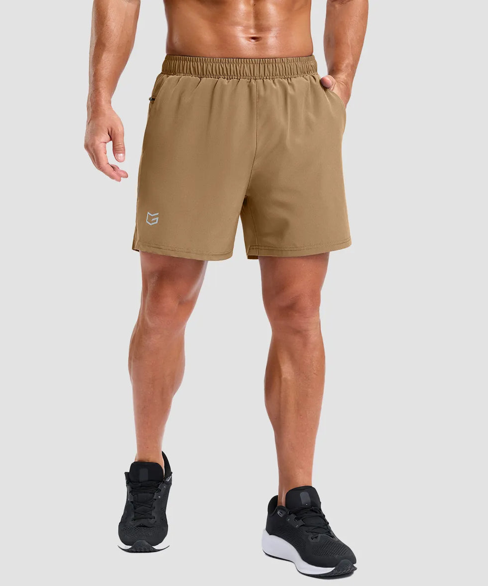 elastic waist split hem shorts 5'' in dark khaki on model - front view