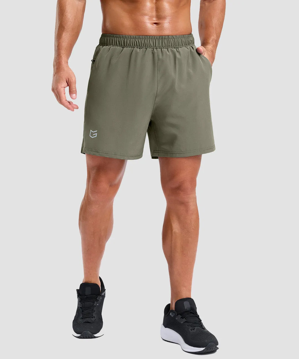 elastic waist split hem shorts 5'' in gray sage on model - front view
