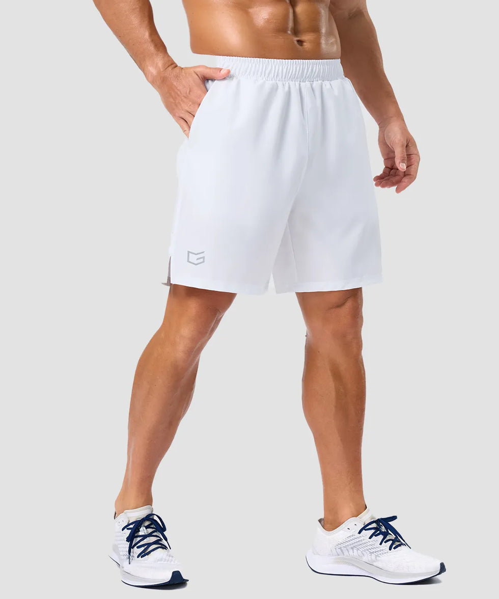 elastic waist split hem shorts 7'' in white on model - front view