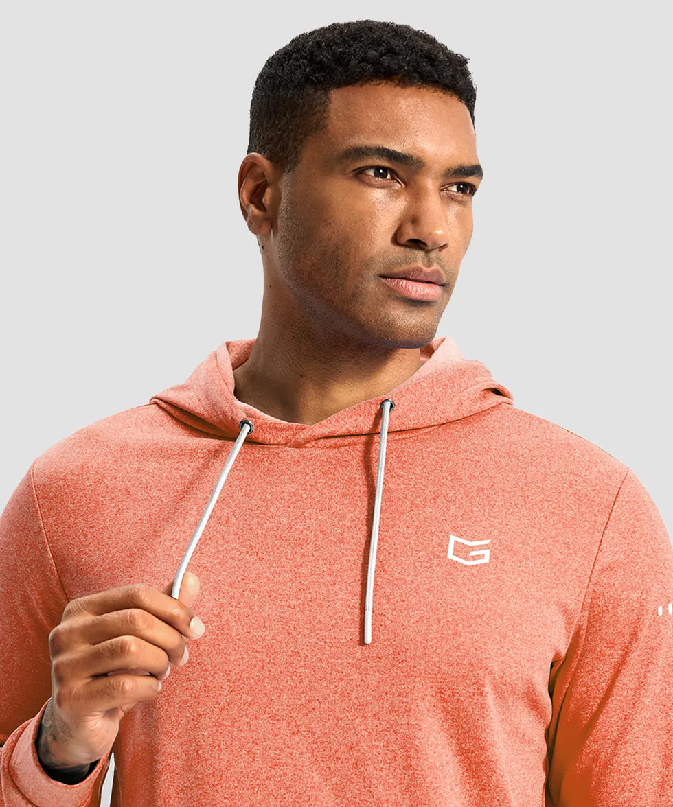 fleece long sleeve hoodie in heather orange on model - front view