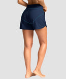 g-drykit™ high waisted pocket swim shorts in dark blue - on model back view