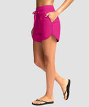 g-drykit™ high waisted pocket swim shorts in rose red - on model side view