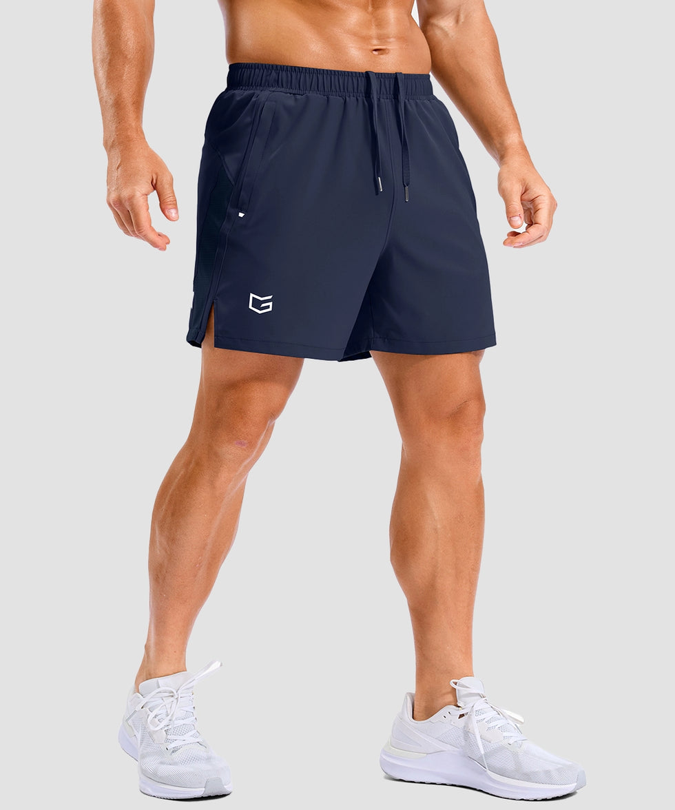 lightweight 5" pocketed athletic shorts in navy - on model front view