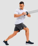 lightweight 7" pocketed athletic shorts in dark gray - on model view