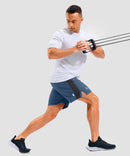 lightweight 7" pocketed athletic shorts in gray blue - on model view