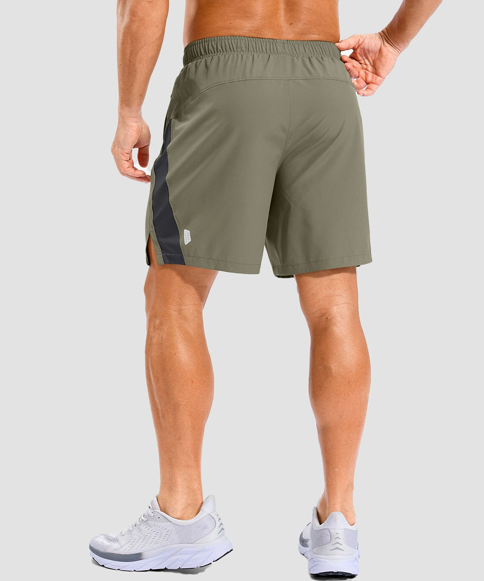 lightweight 7" pocketed athletic shorts in gray sage - on model back view