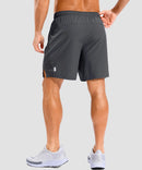 lightweight 7" pocketed athletic shorts in dark gray - on model back view