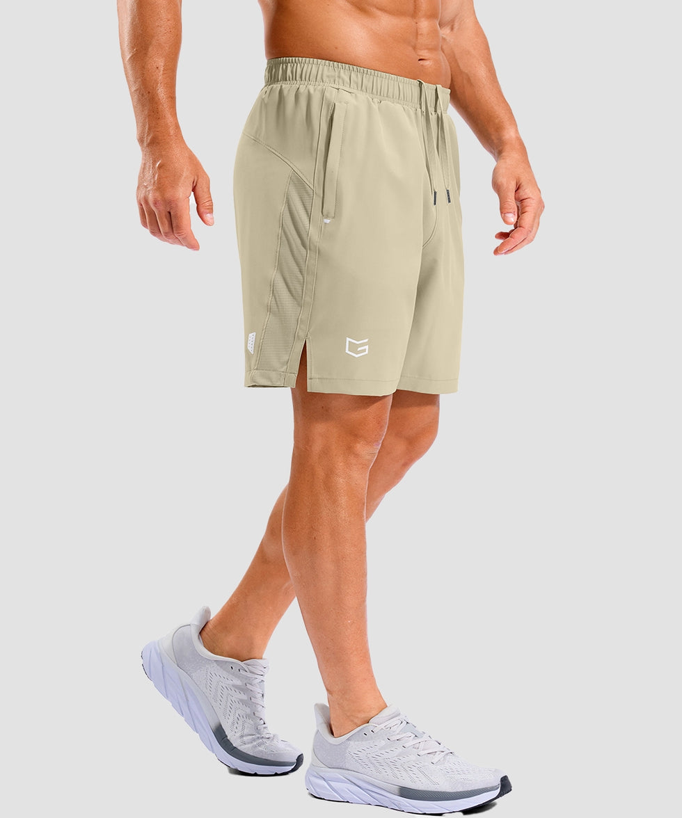 lightweight 7" pocketed athletic shorts in light khaki - on model side view