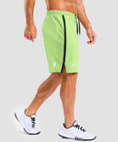 lightweight 9" pocketed athletic shorts in bright green - on model side view