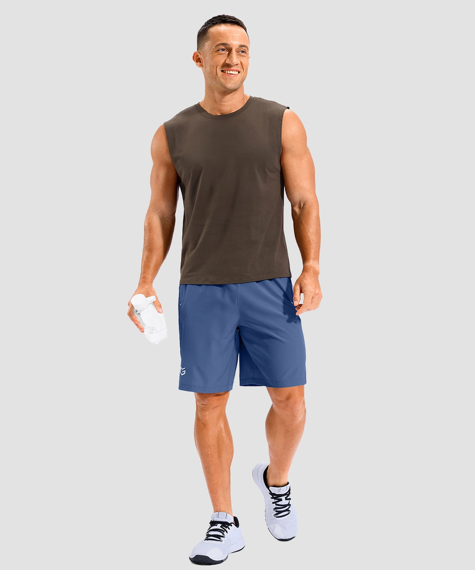 lightweight 9" pocketed athletic shorts in dusty blue - on model front view