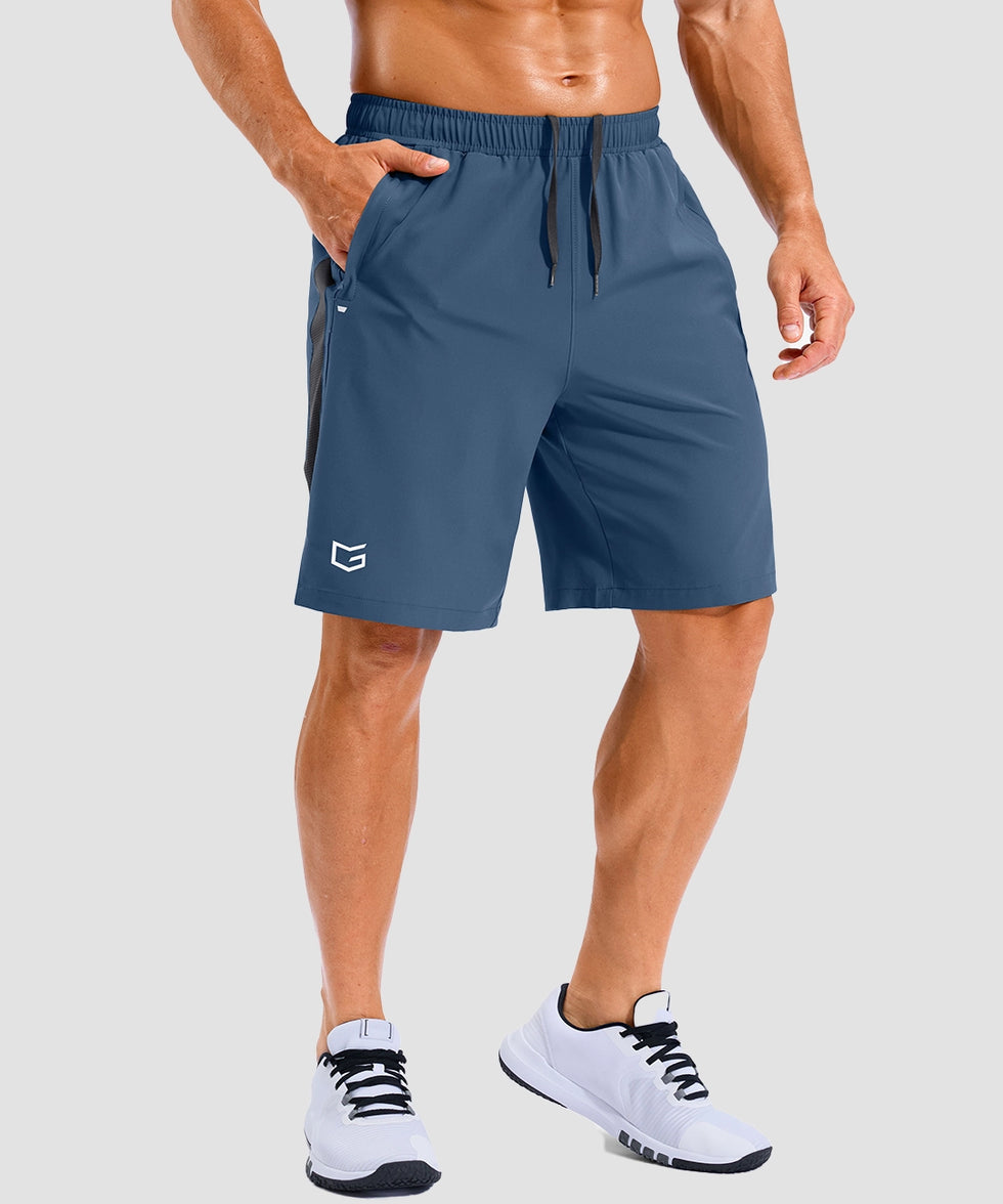 lightweight 9" pocketed athletic shorts in gray blue - on model front view