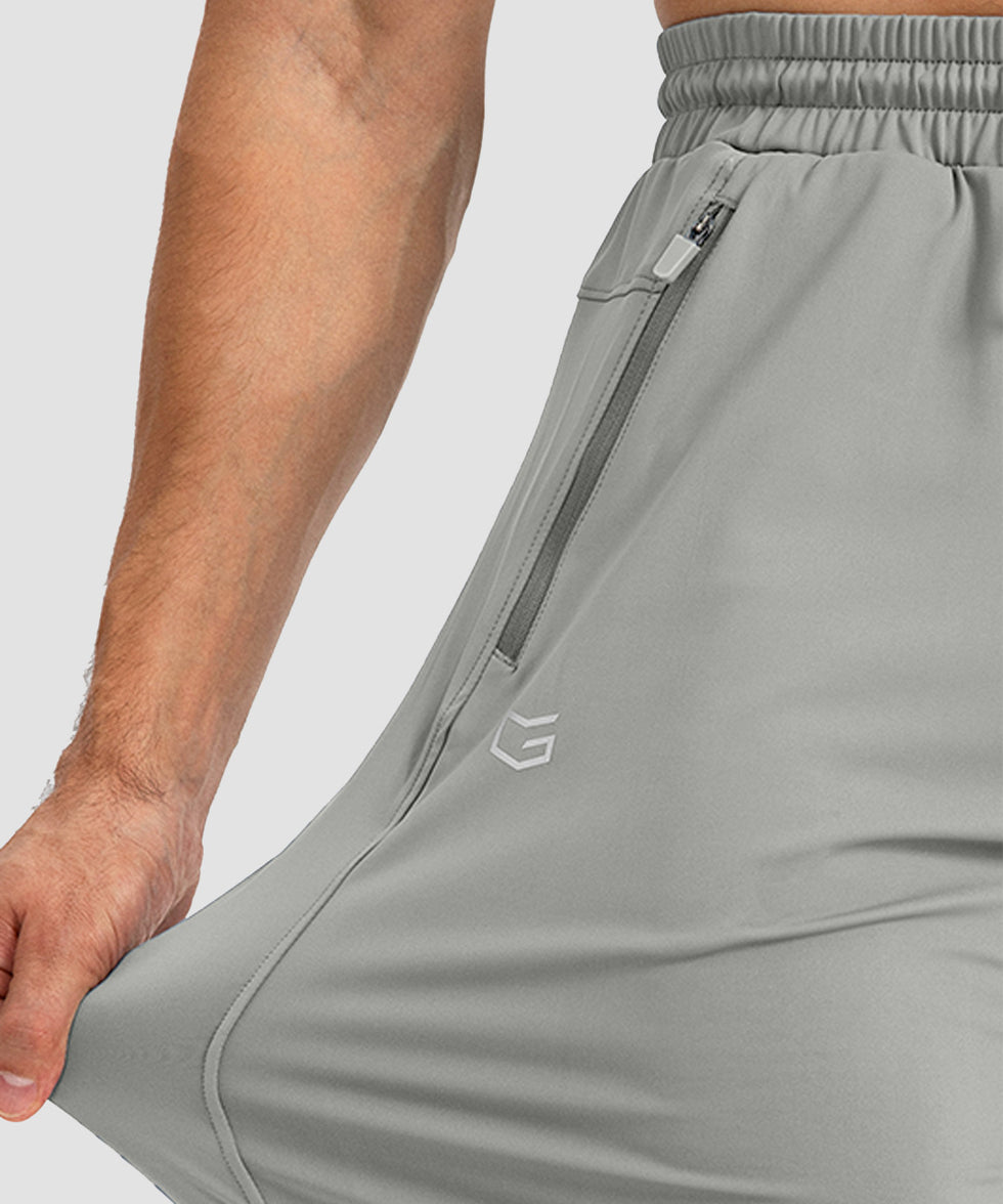 men's drawstring with 3 zipper pockets pant in bright gray - stretchy fabric details view