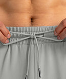 men's drawstring with 3 zipper pockets pant in bright gray - waistband detail view