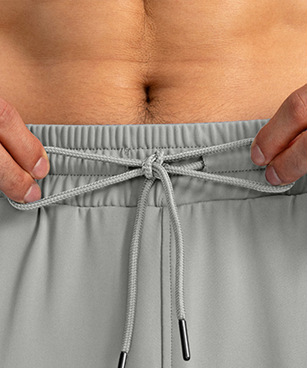 men's drawstring with 3 zipper pockets pant in bright gray - waistband detail view