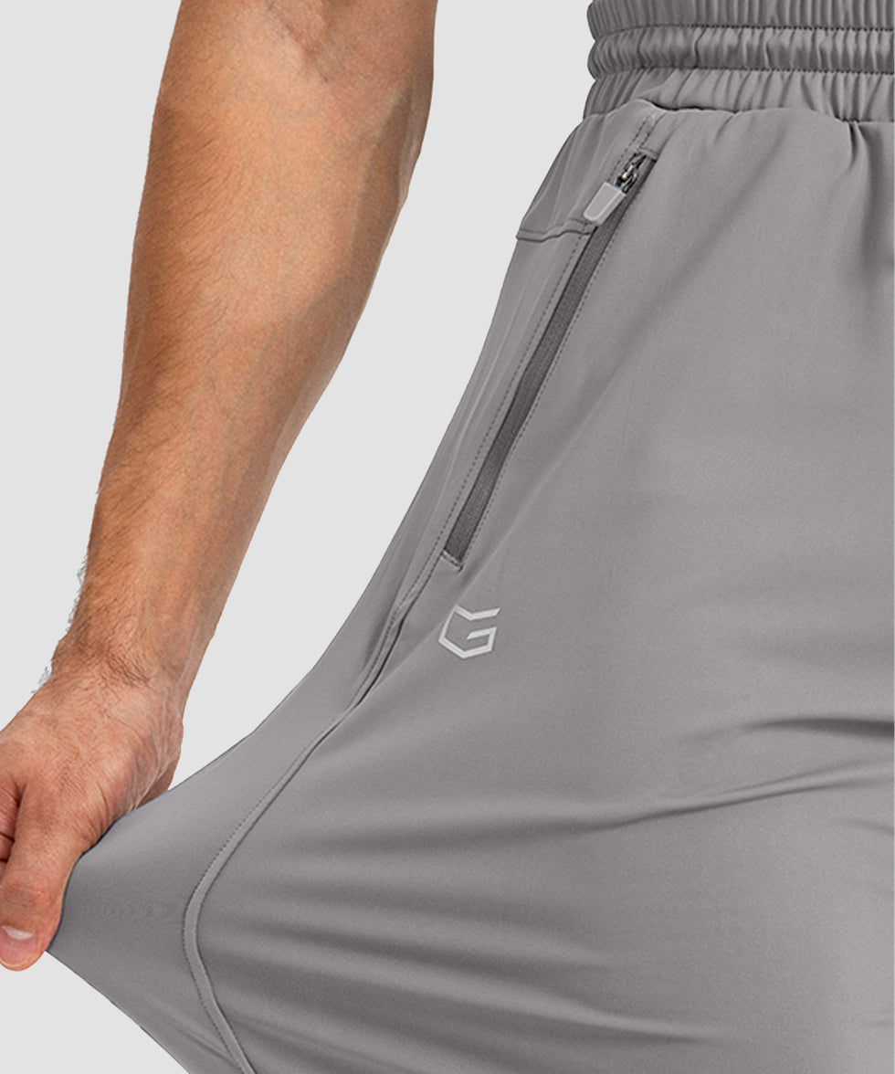 men's drawstring with 3 zipper pockets pant in light gray - stretchy fabric details view