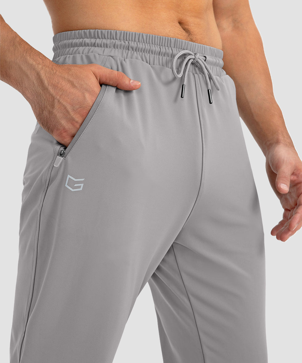 men's drawstring with 3 zipper pockets pant in light gray - zipper pocket detail view