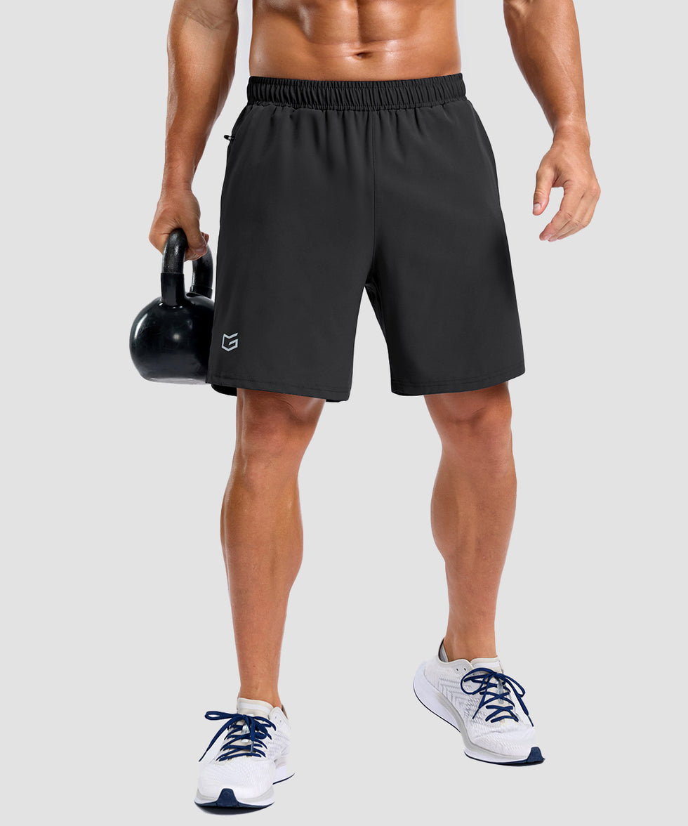men's elastic waist split hem shorts 7'' in black - front view