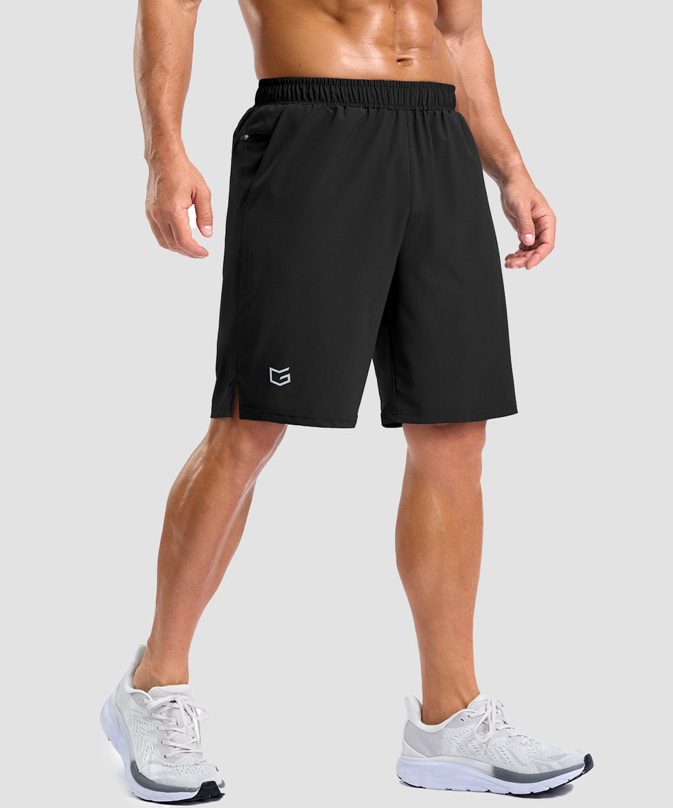 men's elastic waist split hem shorts 9'' in black - front view