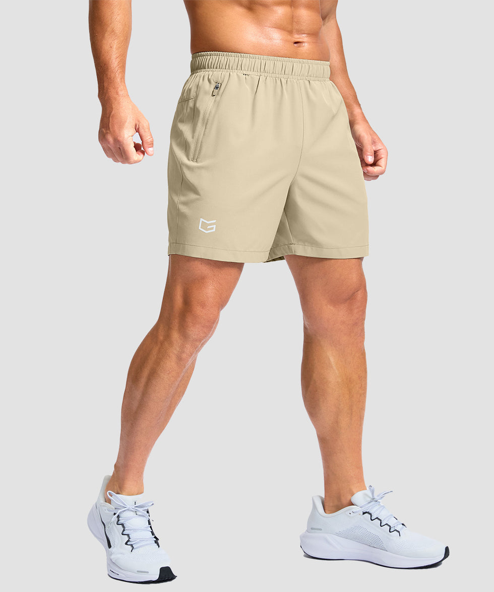 men's elastic waist zipper pockets short 5'' in light khaki - side view