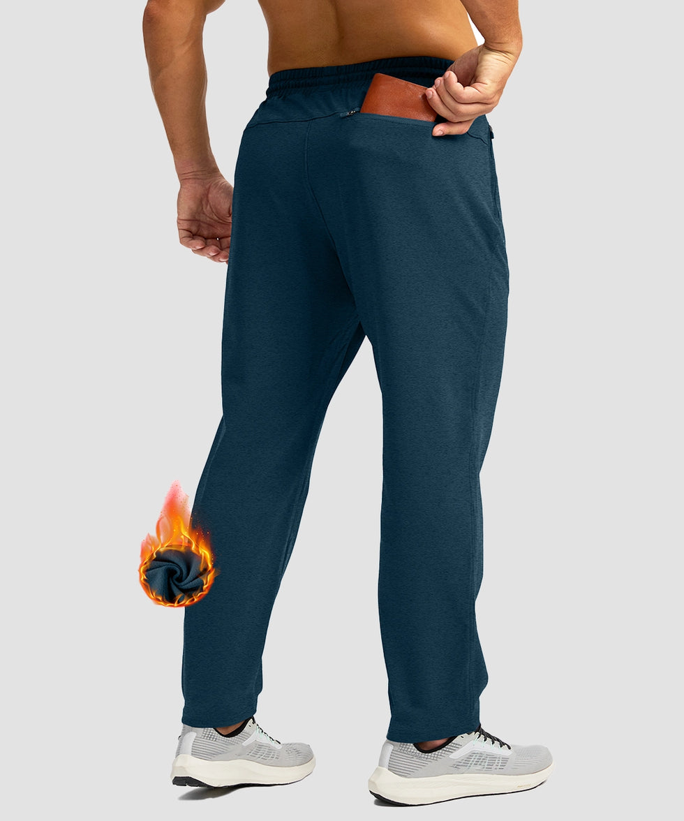 men's fleece-lined zip pockets stretch sweatpants in heathered academy blue - back view