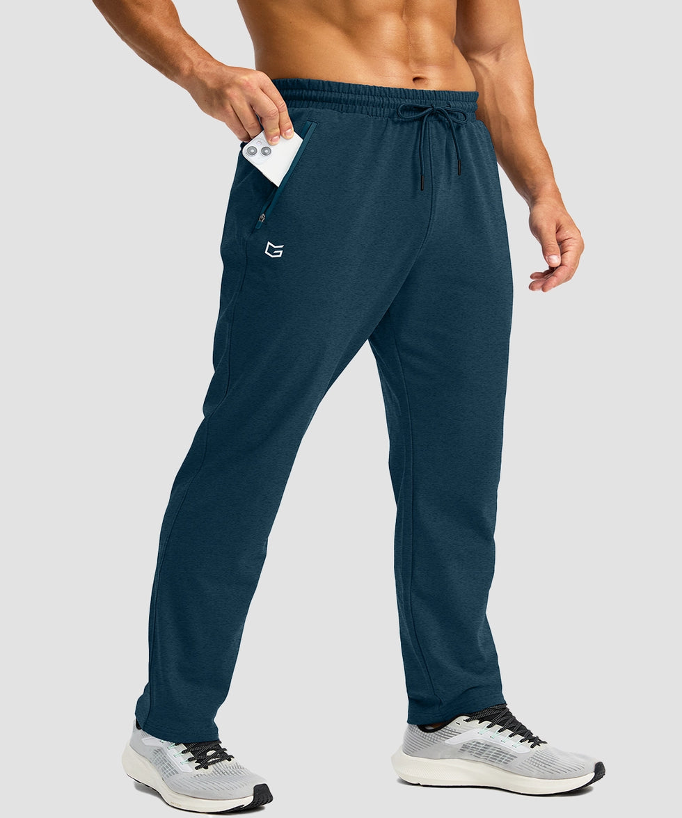 men's fleece-lined zip pockets stretch sweatpants in heathered academy blue - zip pocket detail view