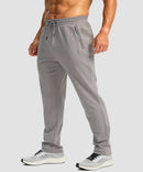 men's fleece-lined zip pockets stretch sweatpants in light gray - side view