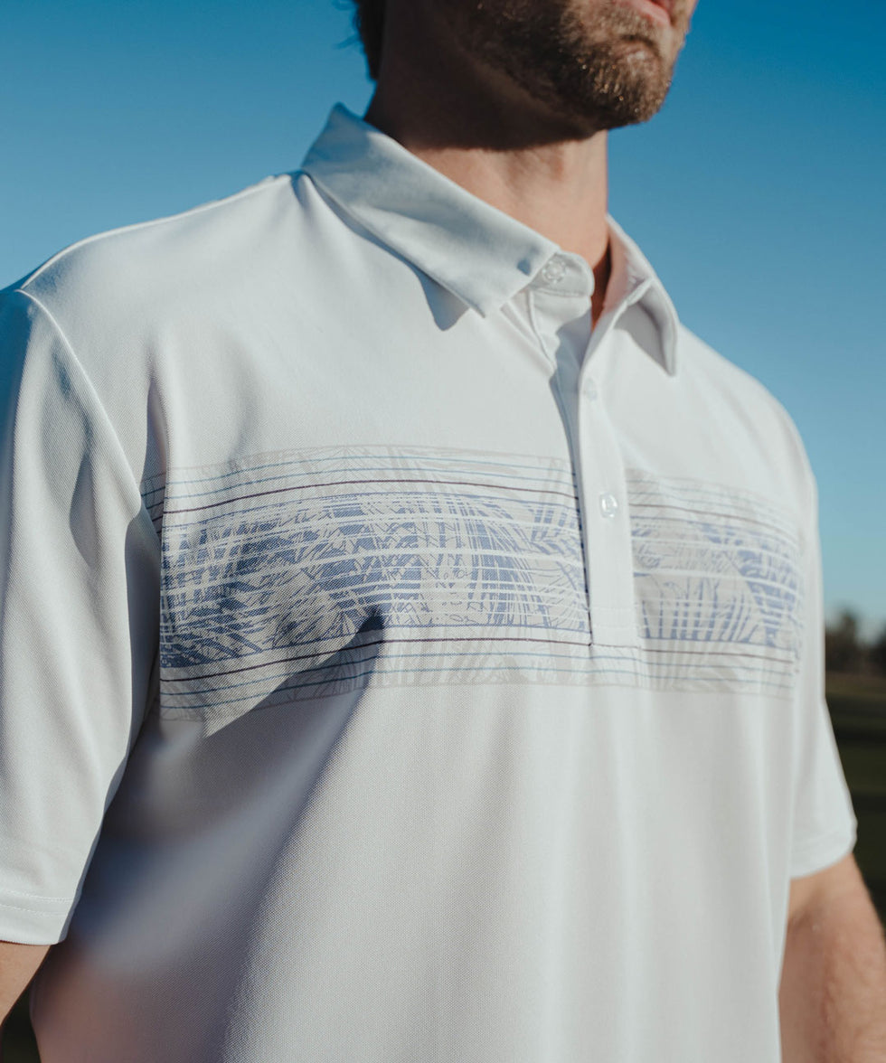 men's line print dry fit golf polo in white leaves - button detail