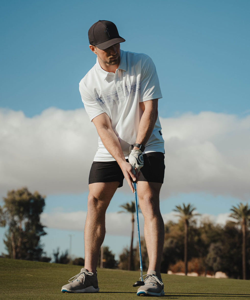 men's line print dry fit golf polo in white leaves - print detail