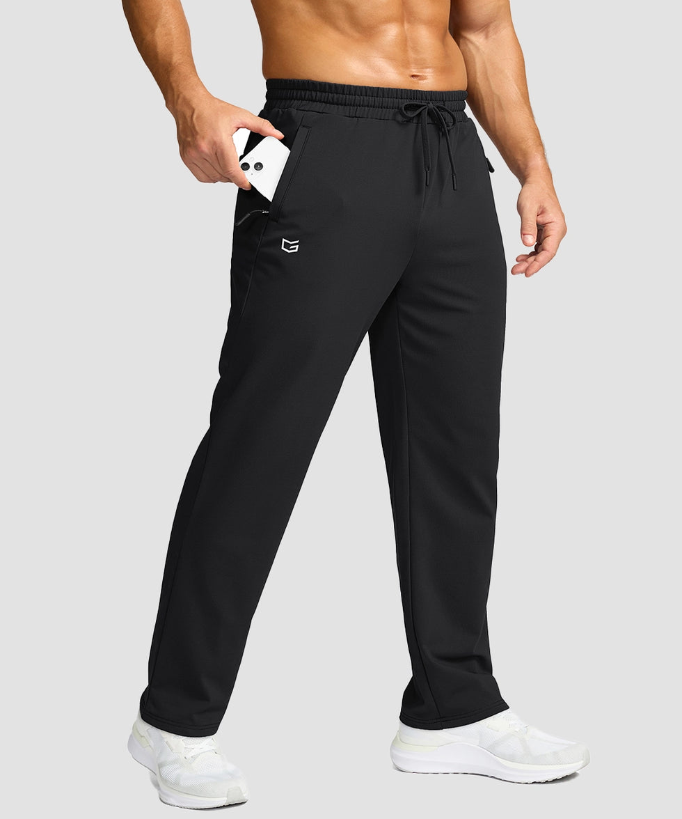 men's mid-rise fleece-lined track pants in black - pocket detail view