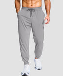 men's mid-rise with pockets stretchy joggers in light gray - front view