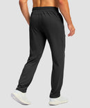 men's mid rise tapered pants in black - back view