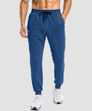 men's static-free stretch athletic joggers in heather dark blue - front view