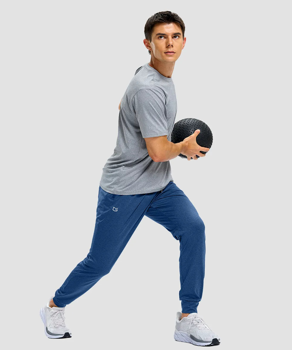 men's static-free stretch athletic joggers in heather dark blue - side view