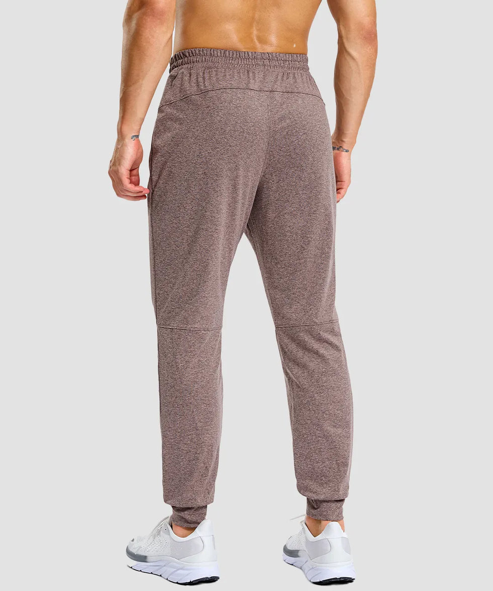 men's static-free stretch athletic joggers in heather dark pink - back view