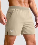 mid rise elastic waist slit short 5" in light khaki - front view