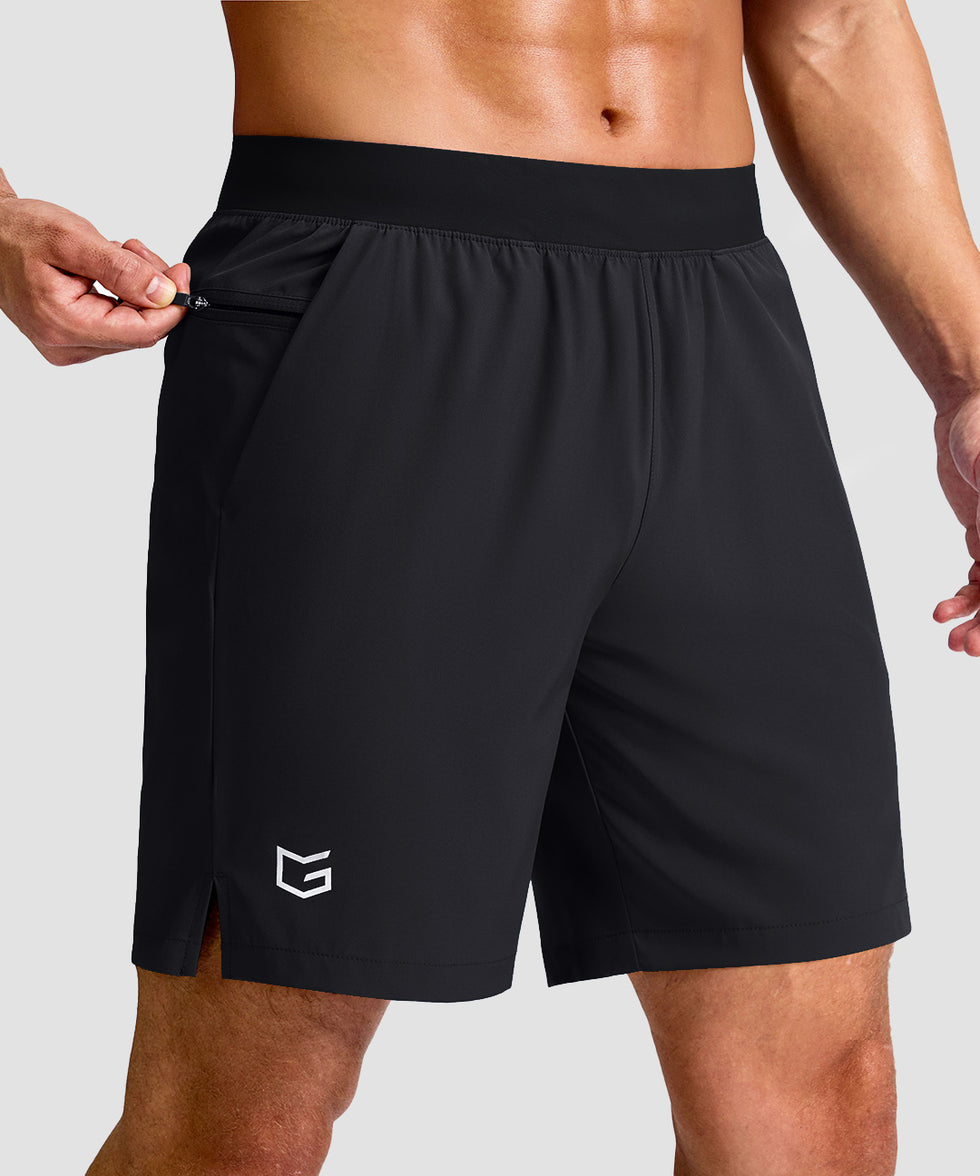 mid rise elastic waist slit short 7" in black - front view