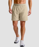 mid rise elastic waist slit short 7" in light khaki - on model front view