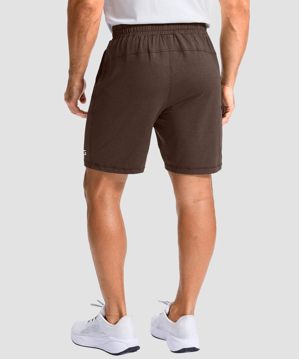 moisture wicking athletic sweat shorts in brown - on model back view