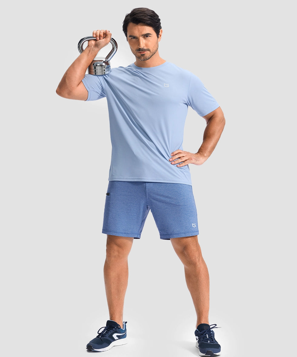moisture wicking athletic sweat shorts in heather haze blue - on model kettlebell workout view