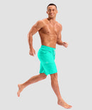 quick dry 9" pocketed board shorts in cyan - on model view
