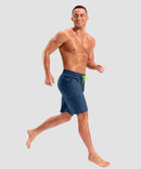 quick dry 9" pocketed board shorts in dark blue - on model view