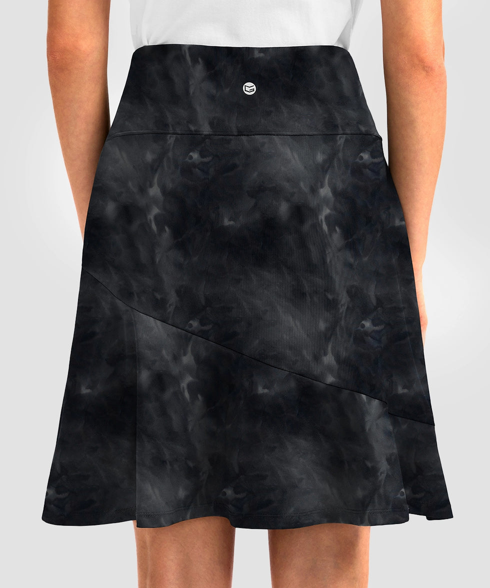 ruffle modest golf skort in black tie-dye - back view