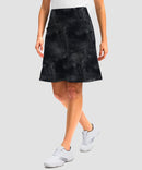 ruffle modest golf skort in black tie-dye - side view