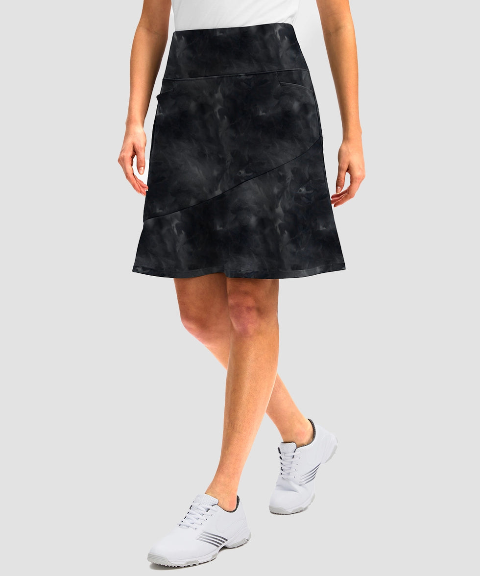 ruffle modest golf skort in black tie-dye - side view