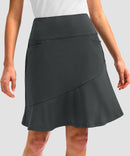 ruffle modest golf skort in dark grey - pocket details view