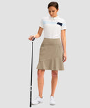 ruffle modest golf skort in light khaki - front view