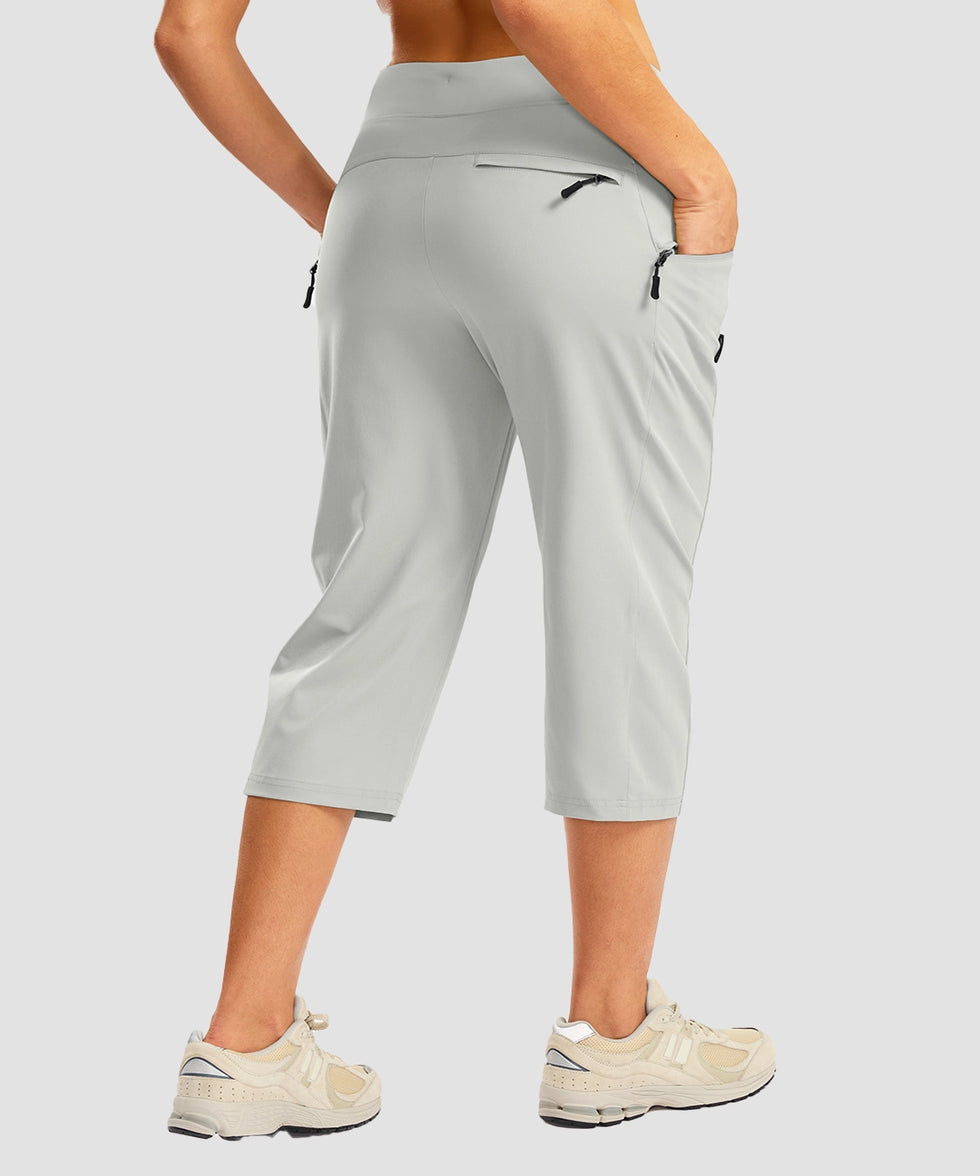 women's 3 zipper pockets hiking capri pants in bright gray - back view