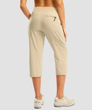 women's 3 zipper pockets hiking capri pants in light khaki - back view