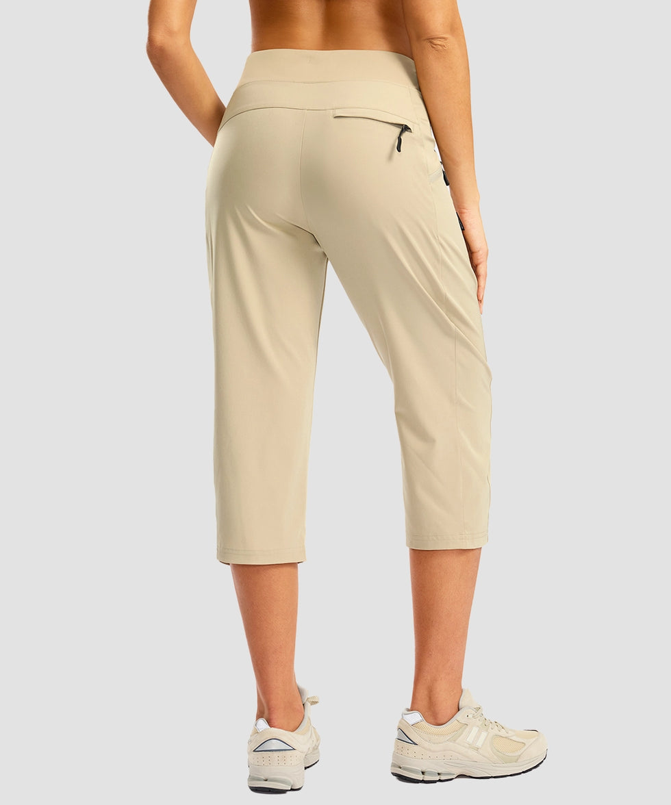 women's 3 zipper pockets hiking capri pants in light khaki - back view