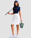 women's 4 pockets knee length golf skort in white - side view